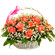 basket of coral roses with babys breath. Bahamas